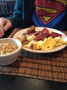 Eggs, yogurt and granola, turkey bacon, corn beef hash, and home fries. 