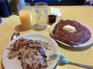 Corned Beef Hash, pancakes, and juice.